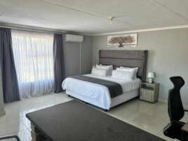 Luxury Suite, Mountain View | Desk, laptop workspace, iron/ironing board, free WiFi