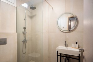 Shower, towels, soap, shampoo