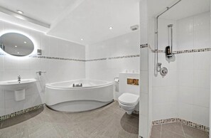 Shower, hair dryer, towels, toilet paper