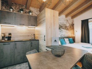 Deluxe Studio, Balcony, Mountain View | Private kitchen | Electric kettle, toaster, highchair - Studio Niederseer by we rent (Saalbach)