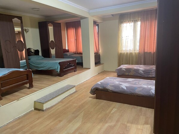 Deluxe Triple Room | 1 bedroom, minibar, desk, laptop workspace