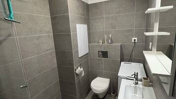 Hair dryer, towels, soap, toilet paper