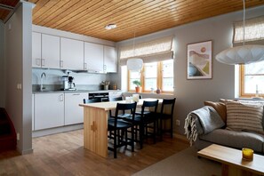 Full-sized fridge, coffee/tea maker, toaster, cleaning supplies