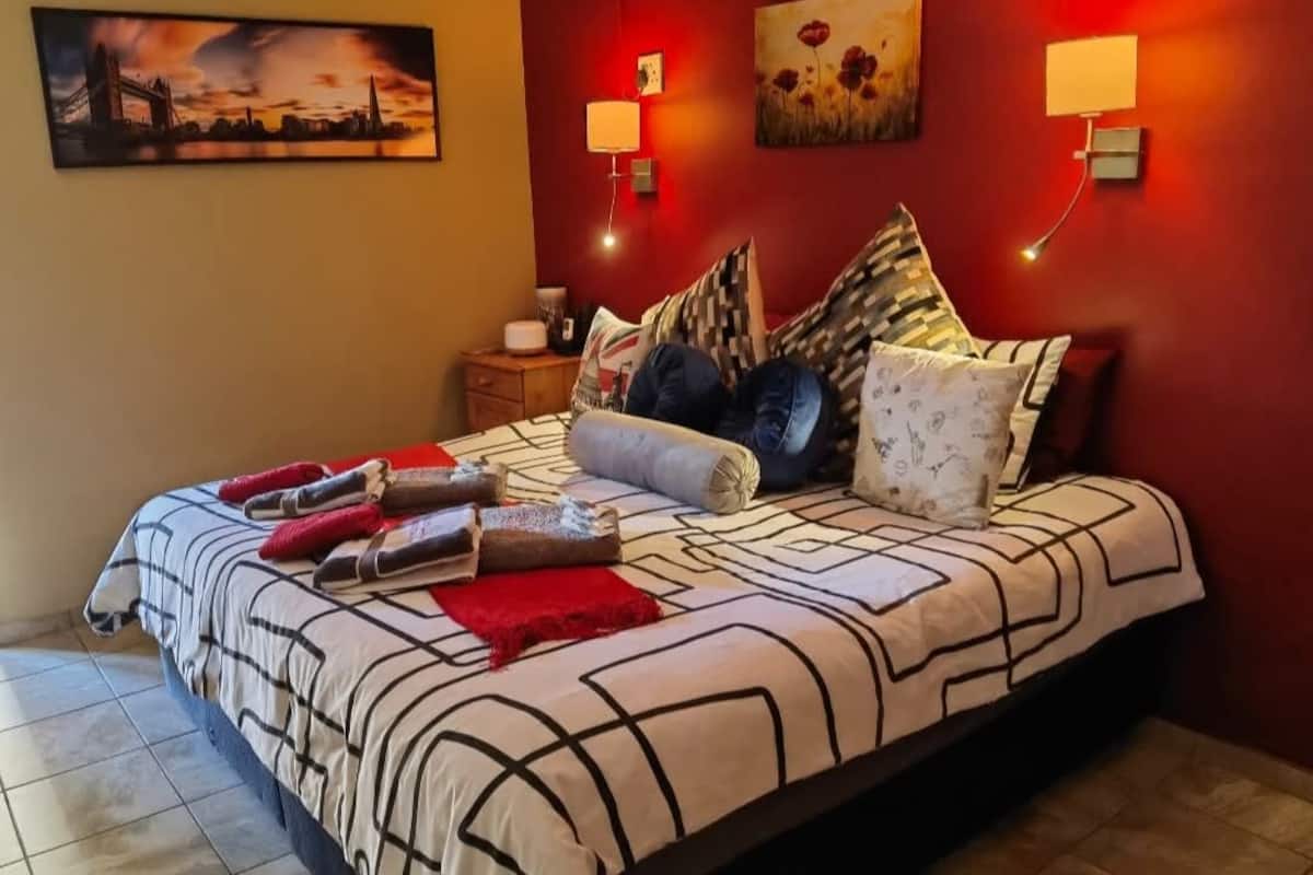 Suite Executive, 1 letto king, aria condizionata, vista giardino | 1 camera, biancheria da letto di alta qualità, copriletto in piuma