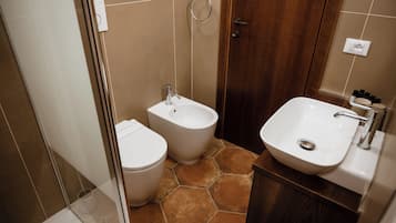 Hair dryer, bidet, towels, soap