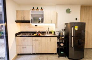 Fridge, microwave, dishwasher, coffee/tea maker
