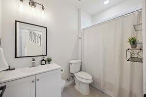 Hair dryer, towels, soap, toilet paper