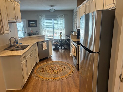   3-bedroom townhome ten minutes from  UT campus. Total fresh remodel.