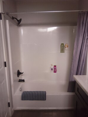 Hair dryer, towels, soap, shampoo