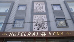A hotel facade with the name HOTELRAJ HANS. - Hotel Rajhans (Danta Ramgarh)