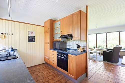 "Schleiparadies" vacation home in Ulsnis with conservatory, fireplace and far-reaching views over orchards - ideal for a quiet break in the middle of nature