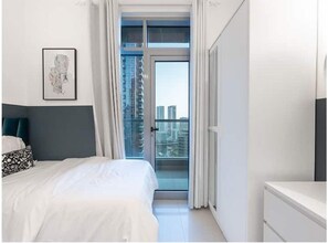 2 عدّة غرف نوم ومكواة/لوح كي وواي فاي مجانًا وملاءات أسرّة