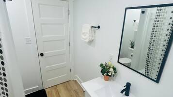 Hair dryer, towels, soap, toilet paper