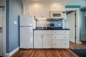 Fridge, microwave, stovetop, cookware/dishes/utensils