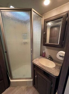 Hair dryer, towels, soap, shampoo