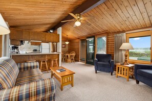 TV, fireplace - Rustic 2BR Cabin with Deck Overlooking Golf Course (Breezy Point)