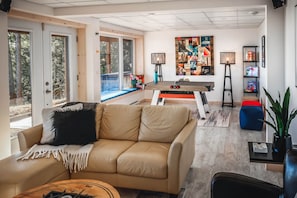Games room - Hôtel à la maison - Le Nid avec spa (Saint-Irénée)