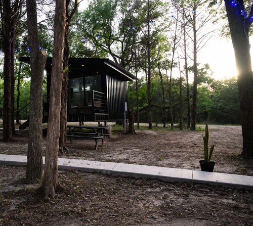 Wooded Retreat w/ Pond View near LBJ Grasslands - 4 Cabins/Sleeps 8