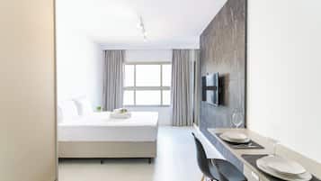 Estúdio | Cortinas blackout, ferros/tábuas de passar roupa, Wi-Fi de cortesia