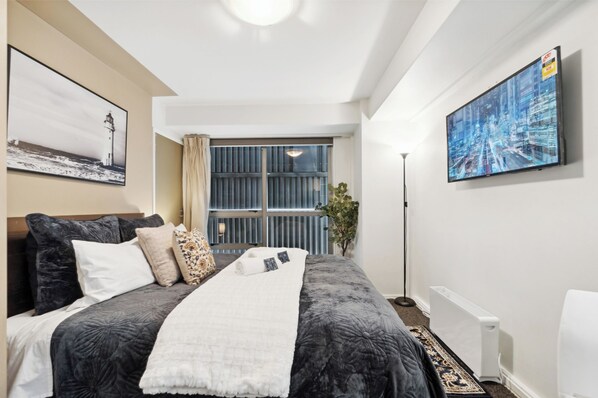 1 habitación, tabla de planchar con plancha, wifi y ropa de cama 