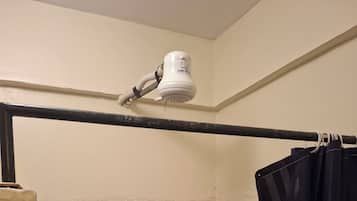 Shower, towels, soap, toilet paper