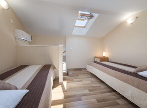 1 chambre, fer et planche à repasser, accès Internet, draps fournis