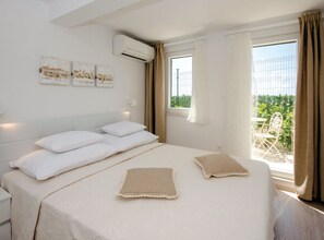 3 dormitorios, tabla de planchar con plancha, Internet y ropa de cama