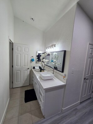 Hair dryer, towels, soap, toilet paper