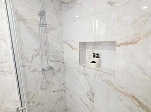 Shower, hair dryer, towels