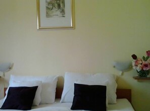 1 habitación, acceso a internet y ropa de cama 