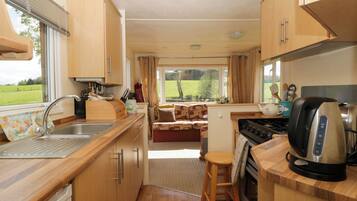 Fridge, microwave, toaster, cookware/dishes/utensils