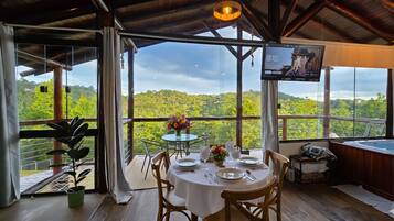 Deluxe Chalet, Patio, Mountain View | In-room dining