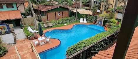 Outdoor pool, open 8:00 AM to 11:00 AM, pool umbrellas, pool loungers