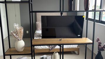 Superior Apartment, 1 Queen Bed with Sofa bed | Living area | 44-inch Smart TV with digital channels