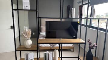 Superior Apartment, 1 Queen Bed with Sofa bed | Living area | 44-inch Smart TV with digital channels