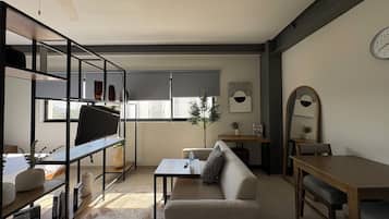 Premium bedding, desk, laptop workspace, free WiFi