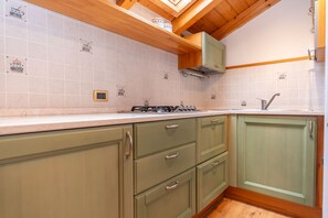 Fridge, microwave, electric kettle, cookware/dishes/utensils