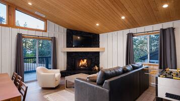 Smart TV, fireplace, video games, foosball