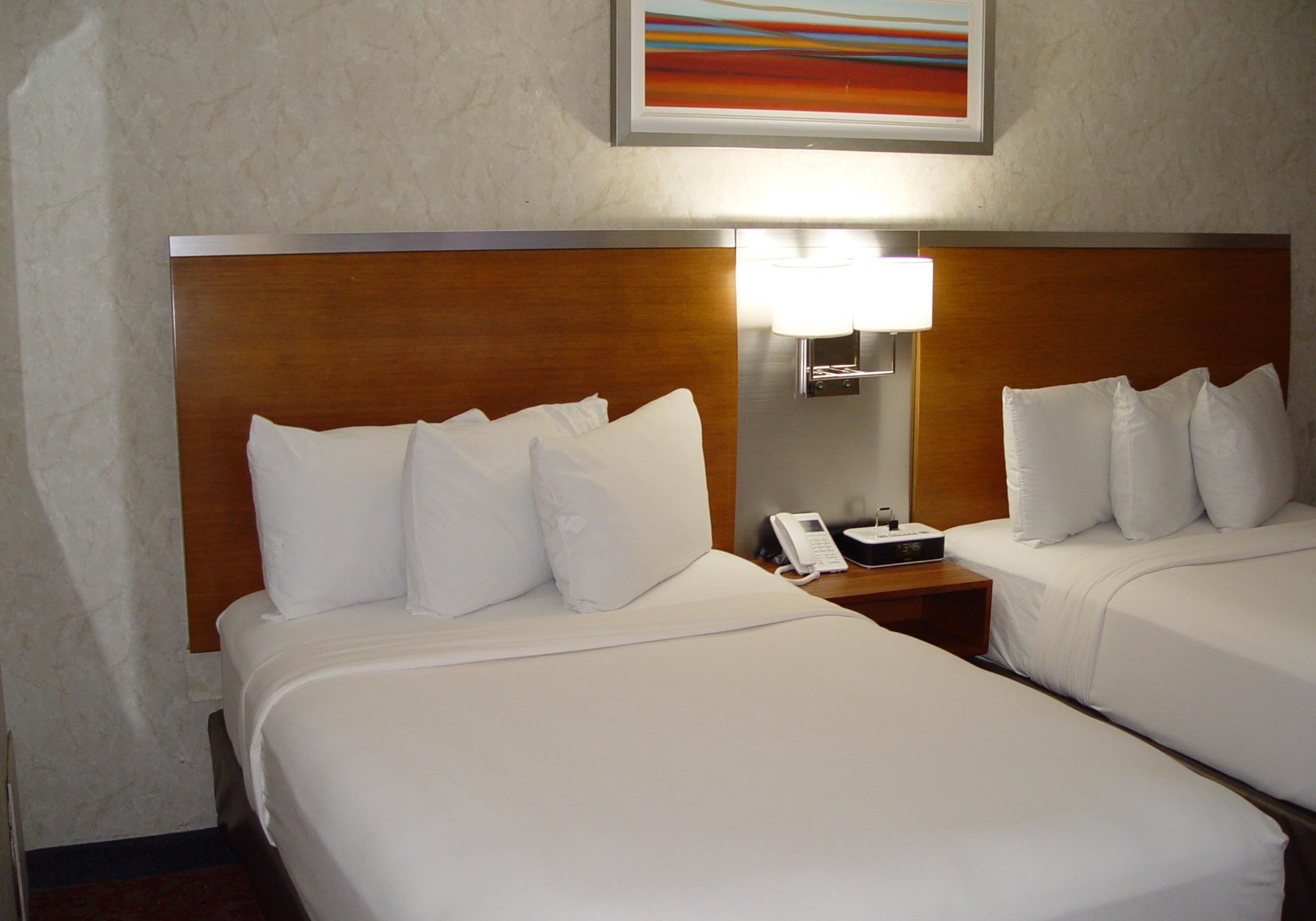 Standard Room, 2 Double Beds, Non Smoking, Courtyard View | Premium bedding, desk, laptop workspace, blackout curtains