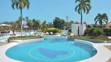 2 outdoor pools, open 8:00 AM to 8:00 PM, pool umbrellas, sun loungers