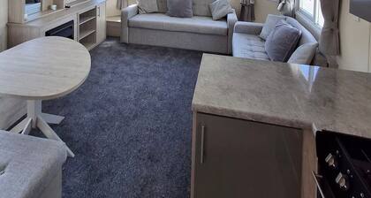 Experience Coastal Bliss: Your Perfect Caravan Getaway at Lido Beach, Prestatyn!