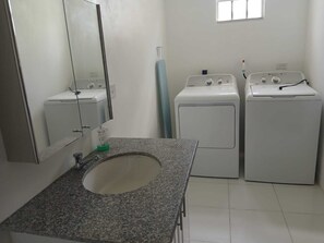 Hair dryer, towels, soap, toilet paper