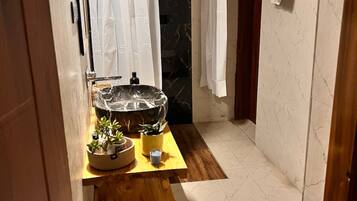 Eco-friendly toiletries, hair dryer, towels, soap