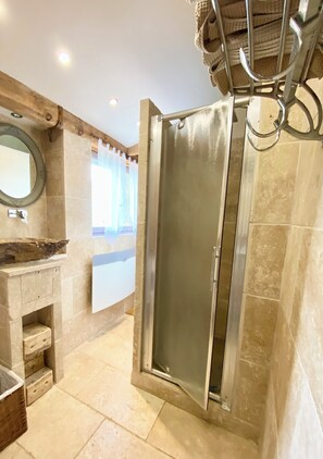 Shower, hair dryer, towels, soap