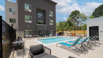 Seasonal outdoor pool, open 7:00 AM to 10:00 PM, pool loungers