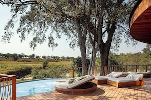 Outdoor pool, open 7:00 AM to 7:00 PM, free pool cabanas, pool loungers