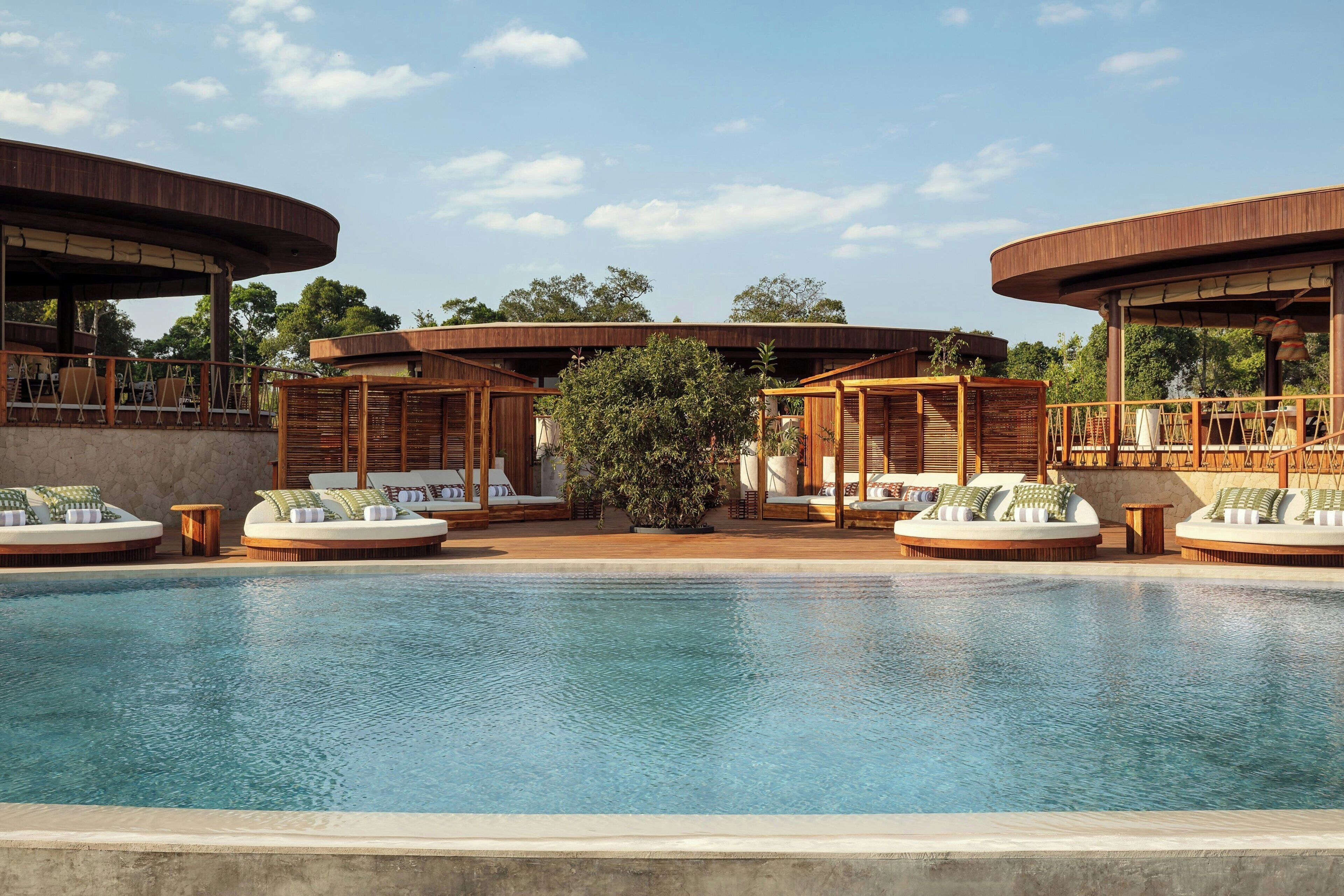 Outdoor pool, open 7:00 AM to 7:00 PM, free pool cabanas, pool loungers