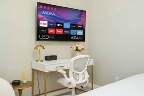 2 habitaciones, tabla de planchar con plancha, cuna de viaje y wifi 