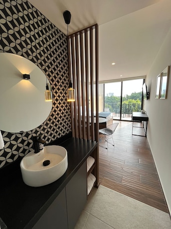 Desk, laptop workspace, blackout drapes, iron/ironing board