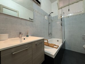 Hair dryer, bidet, towels